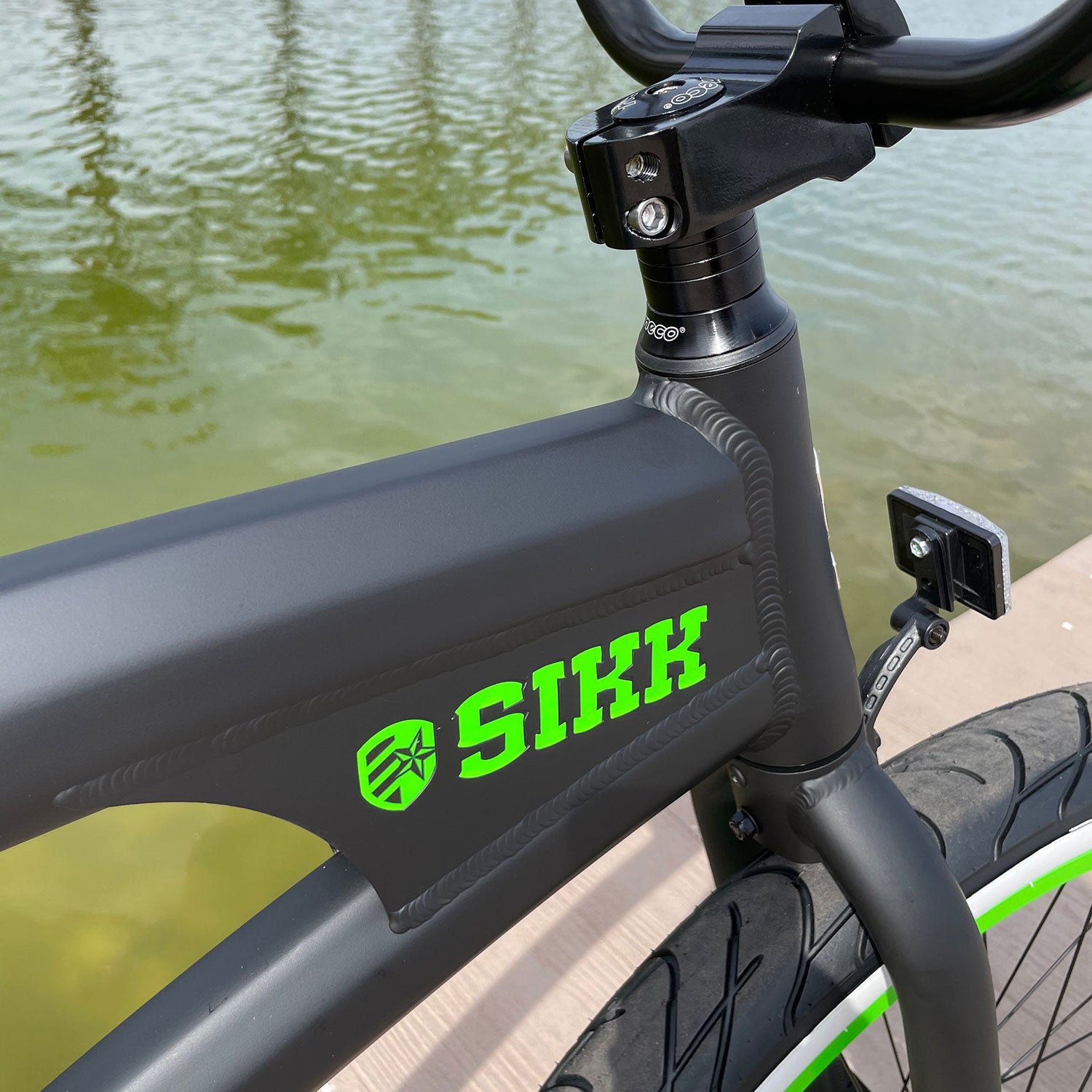 SIKK Wide Ride SS Aluminum Frame Single Speed Flat Black Frame Green Wheels Whitewall Tires